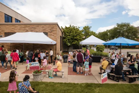 Photo of group engaged in activities outside the library