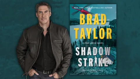 Brad Taylor with his book Shadow Strike