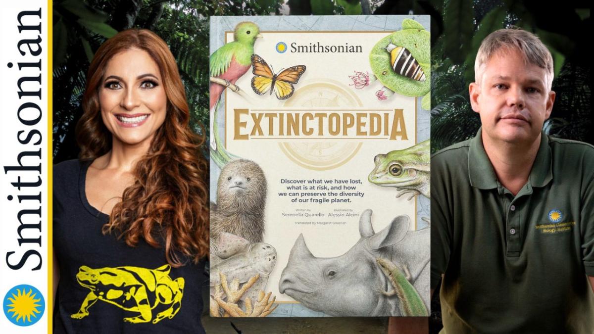 Two Smithsonian scientists next to their book "Extinctopedia"