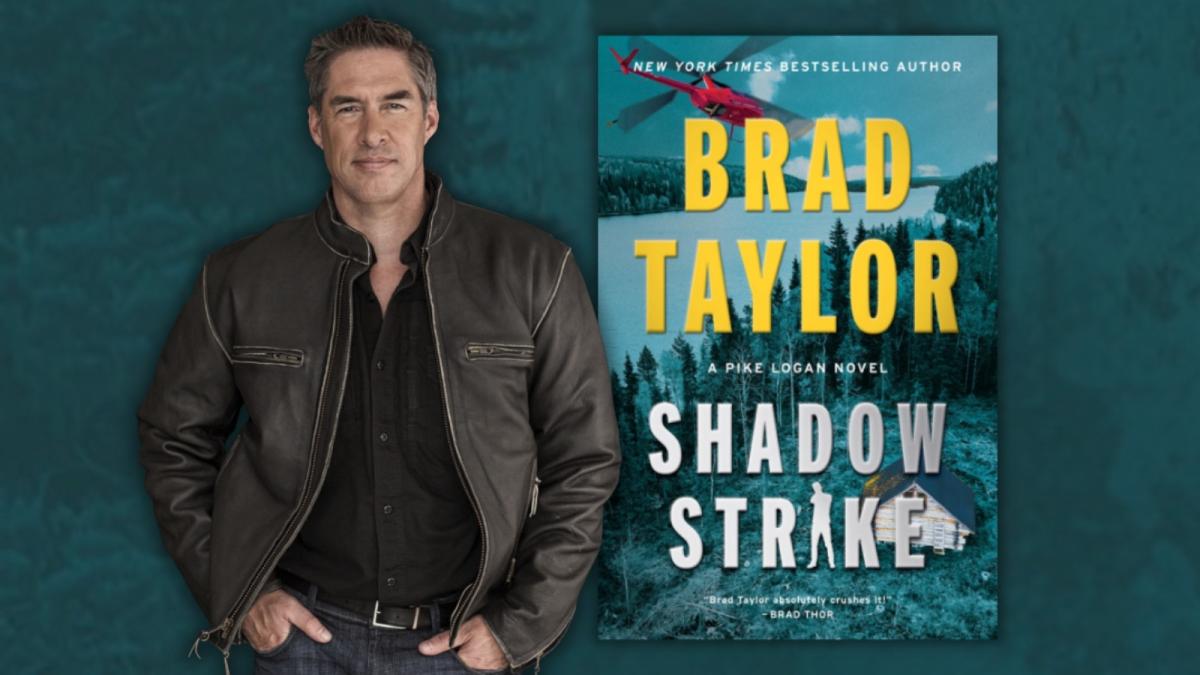 Brad Taylor with his book Shadow Strike